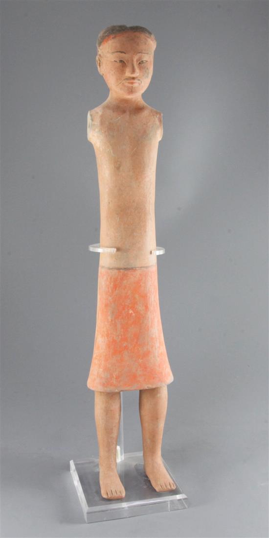 A tall Chinese pottery stick figure of a man, Han dynasty, height 62cm